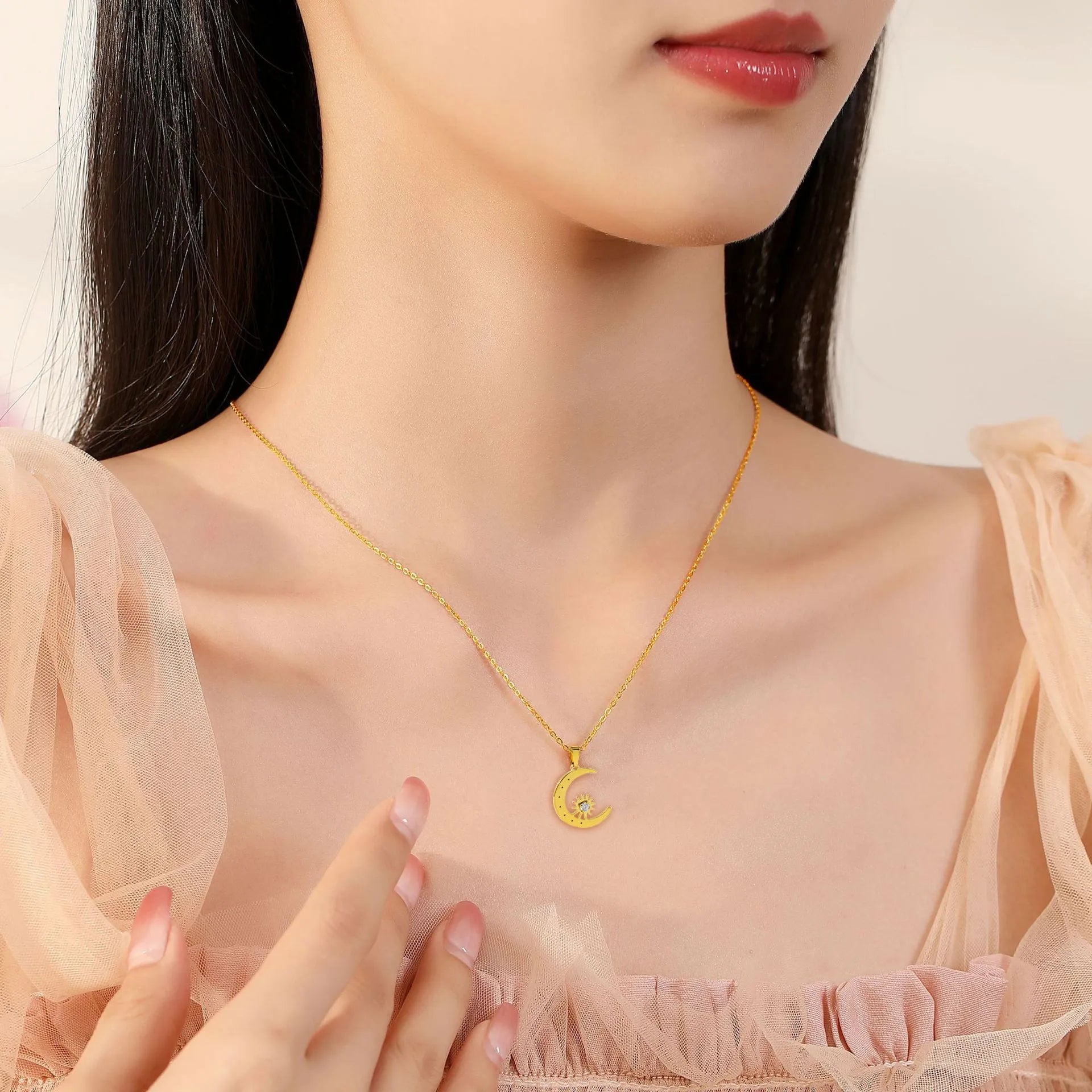 Titanium steel star moon pendant necklace for women, electroplated steel colour, geometric shape on display