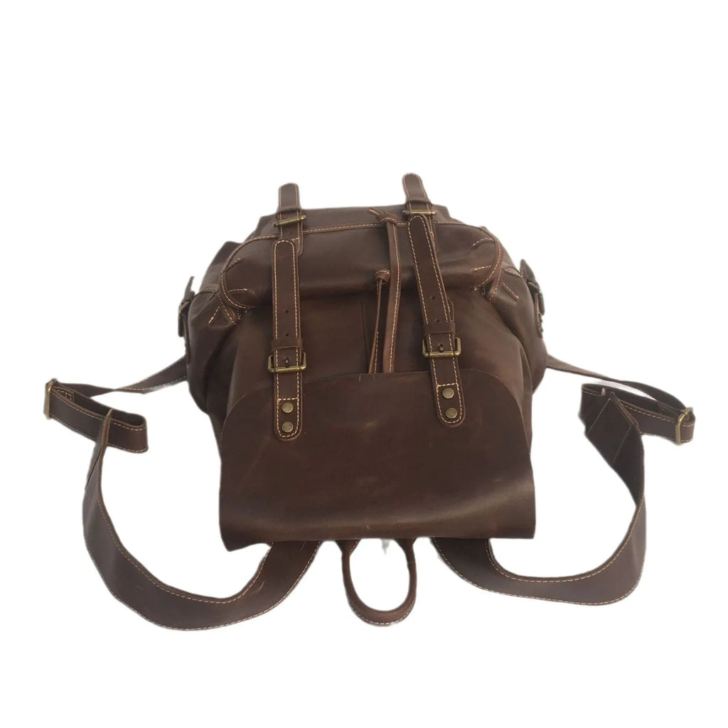 Brown men's cowhide leather backpack with air pillow shoulder straps and a single main compartment.