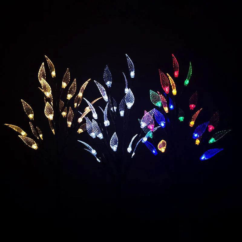 Solar-powered leaf branch garden light measuring 73cm tall with iron and plastic construction