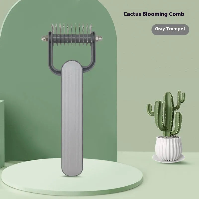 Green and grey dog de-matting combs in small and large sizes, showing angled stainless steel teeth.