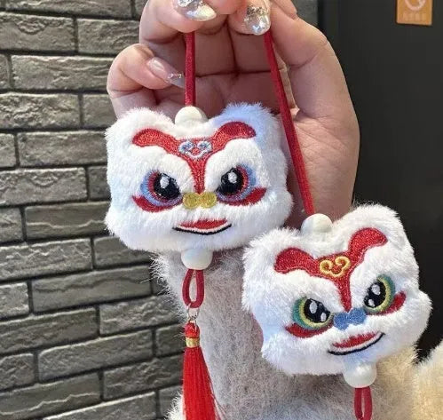 Chinese style blue plush lion keychain ornament with tassel and star stone decorative detail