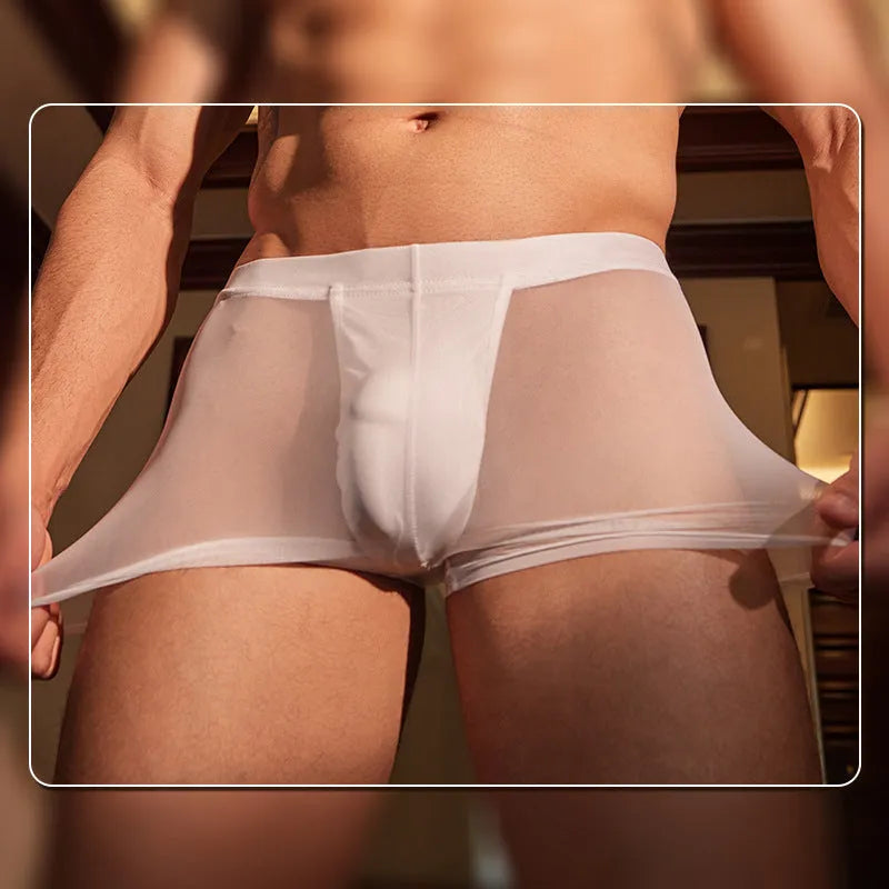 Black men's ultra-thin nylon boxer briefs laid flat, showing free-size stretch fit and minimal seam design.