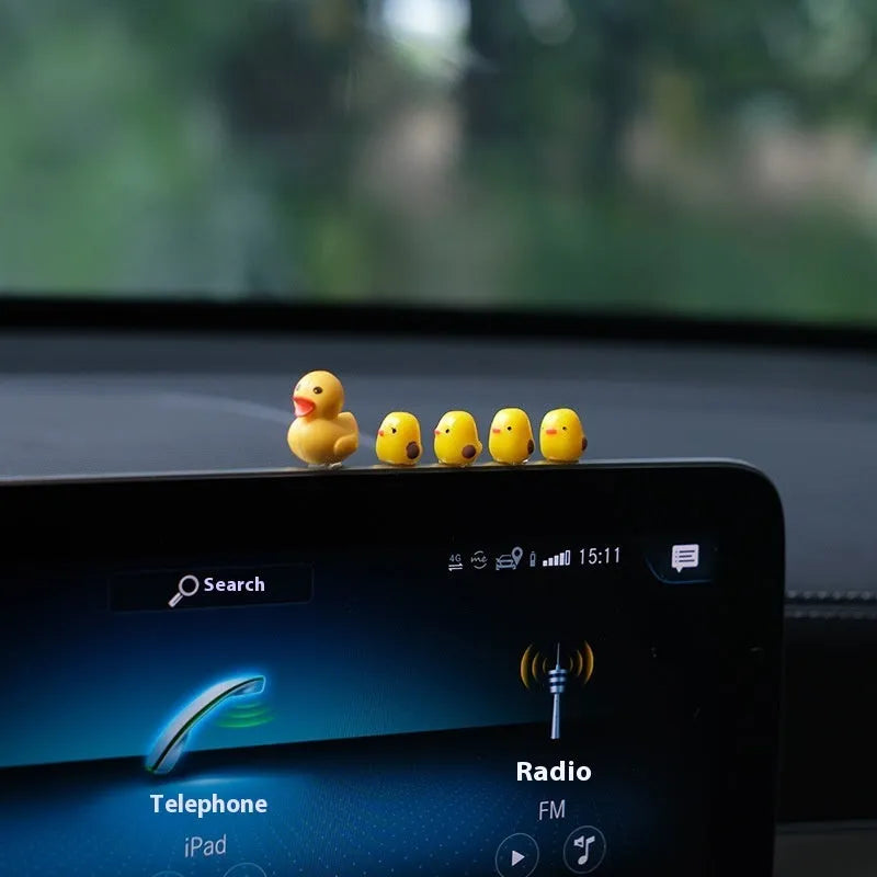 Set of small plastic yellow duck cartoon ornaments for car dashboard decoration