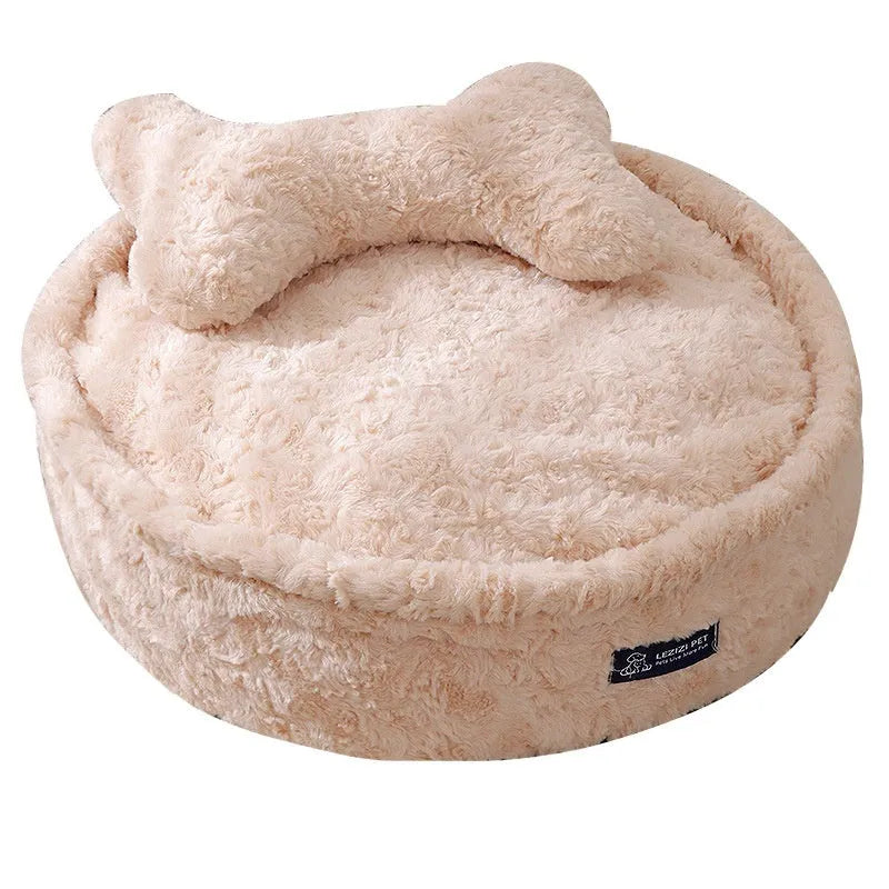 Round nest style pet bed in a milk tea colour with a removable cloth cover.