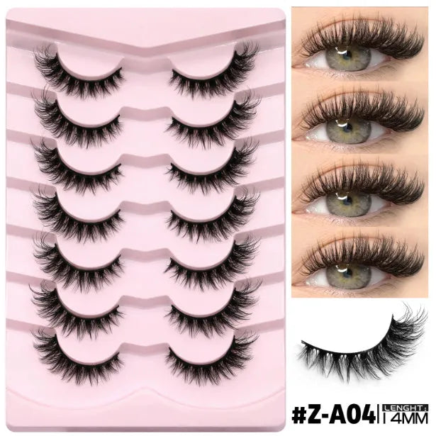 Box of black artificial fibre false eyelashes in a natural thick style with a tube of adhesive glue.