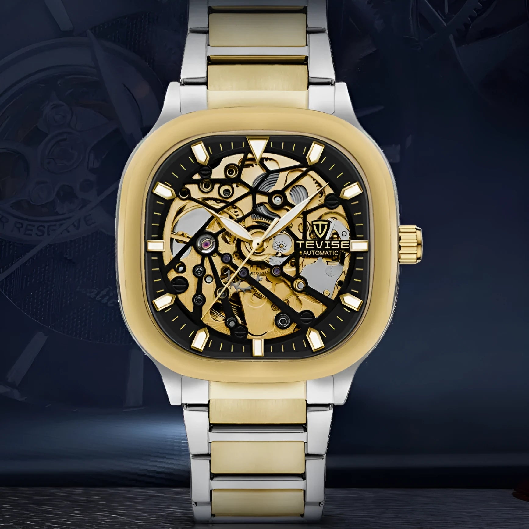 Automatic men's watch with luminous square dial on a stainless steel strap, shown in blue colour.