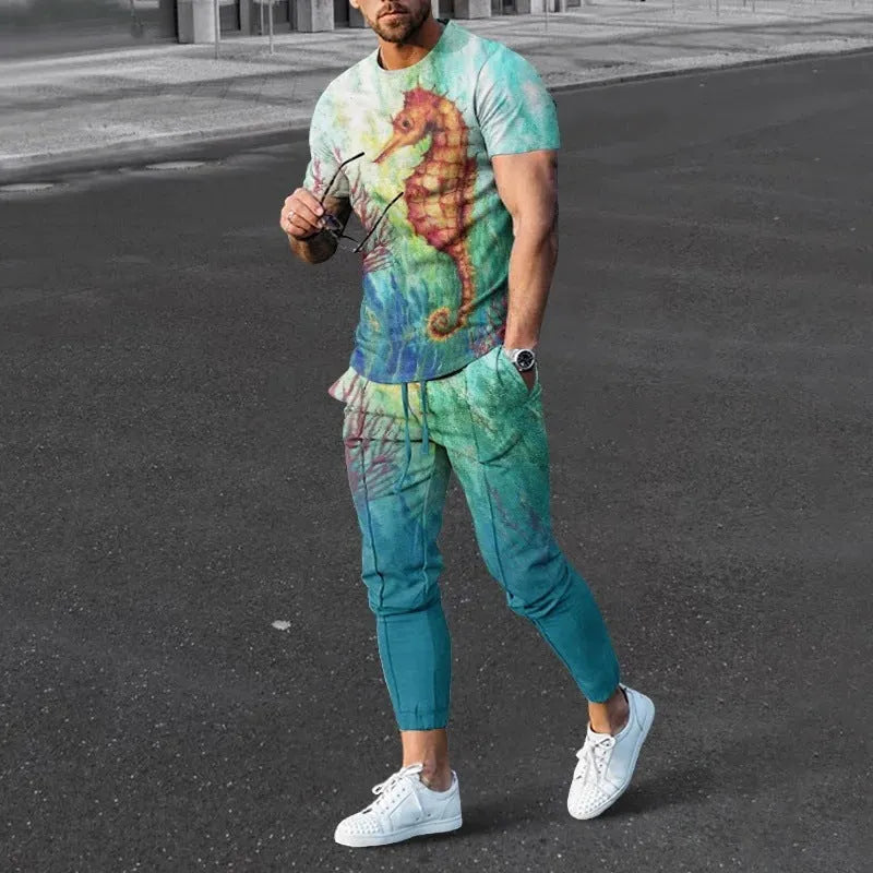 Men's short-sleeved printed pullover suit set with round neck T-shirt and matching trousers on a hanger.