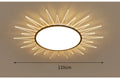 Round modern aluminium LED ceiling lamp with remote control for dimming and light colour selection.