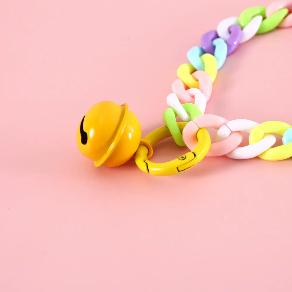 Macaron candy coloured plastic pet collar for cats, dogs and rabbits on a white background.