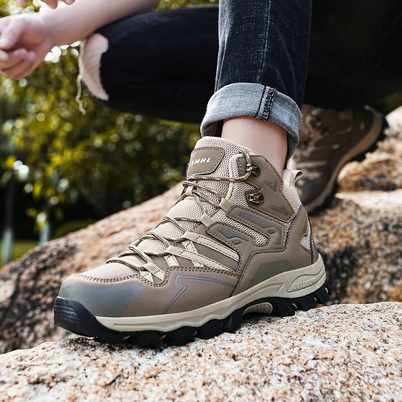 Men's and women's flannel hiking sneakers in various colours on a rocky outdoor path.