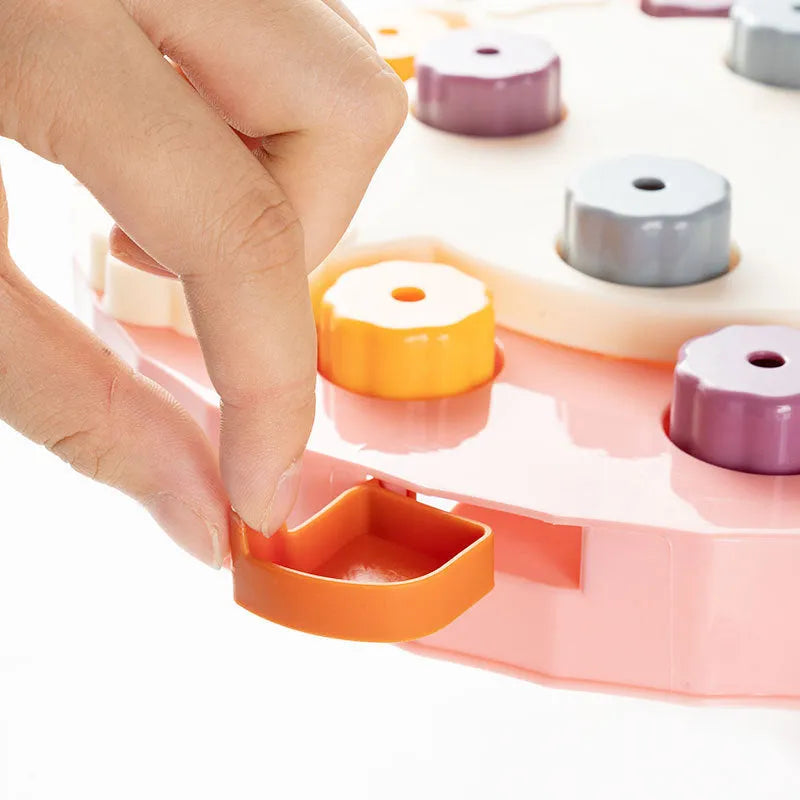 Interactive dog slow feeder puzzle toy in blue, green, and pink colour options.