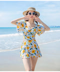Women's dress-style slimming swimsuit with floral printed pattern in polyester fibre