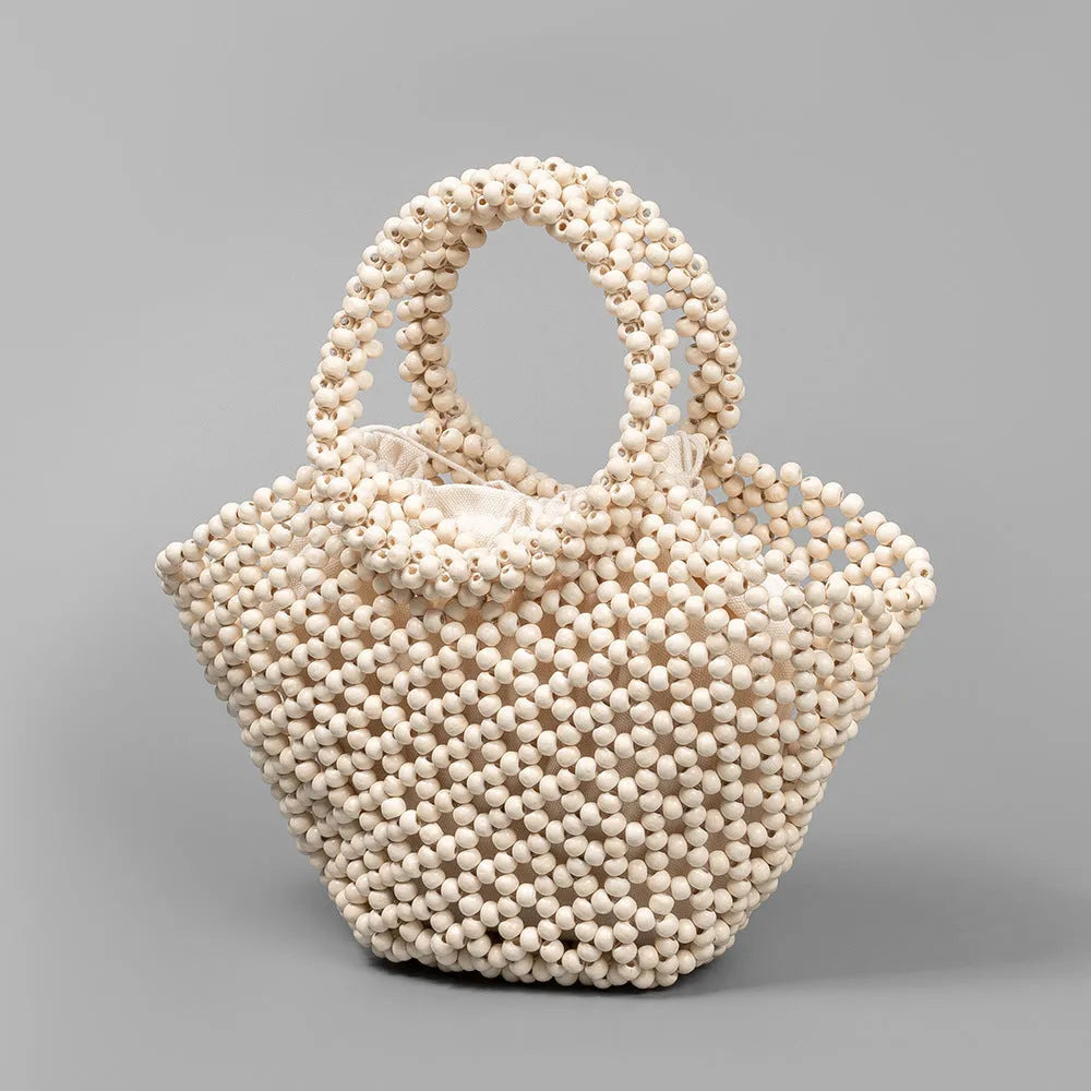 Hand-woven maple hollow handbag with wooden bead decoration, dumpling-shaped 13x7x18cm beach bag