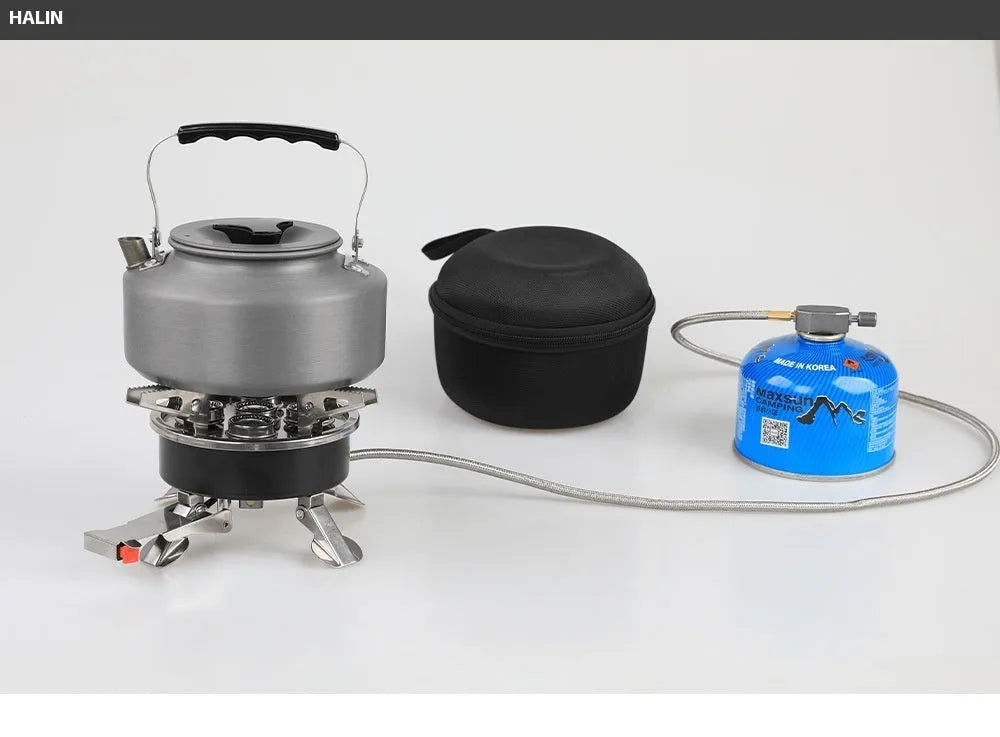 Silver portable split camping stove with fuel hose, shown folded to compact size for transport.