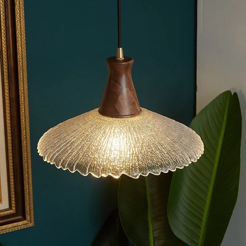 Retro brass and glass woodcraft chandelier ceiling lamp on a white background.