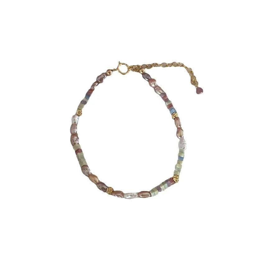 Purple natural pearl bracelet and necklace set with 14K gilded irregular U-shaped beads