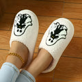 Pair of cartoon ghost embroidery closed-toe slippers with plush upper and non-slip TPR sole