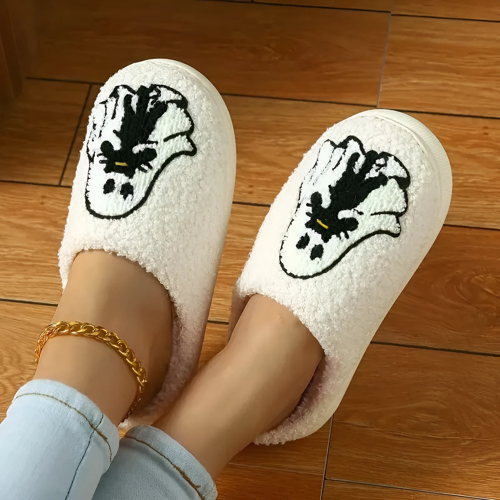 Pair of cartoon ghost embroidery closed-toe slippers with plush upper and non-slip TPR sole