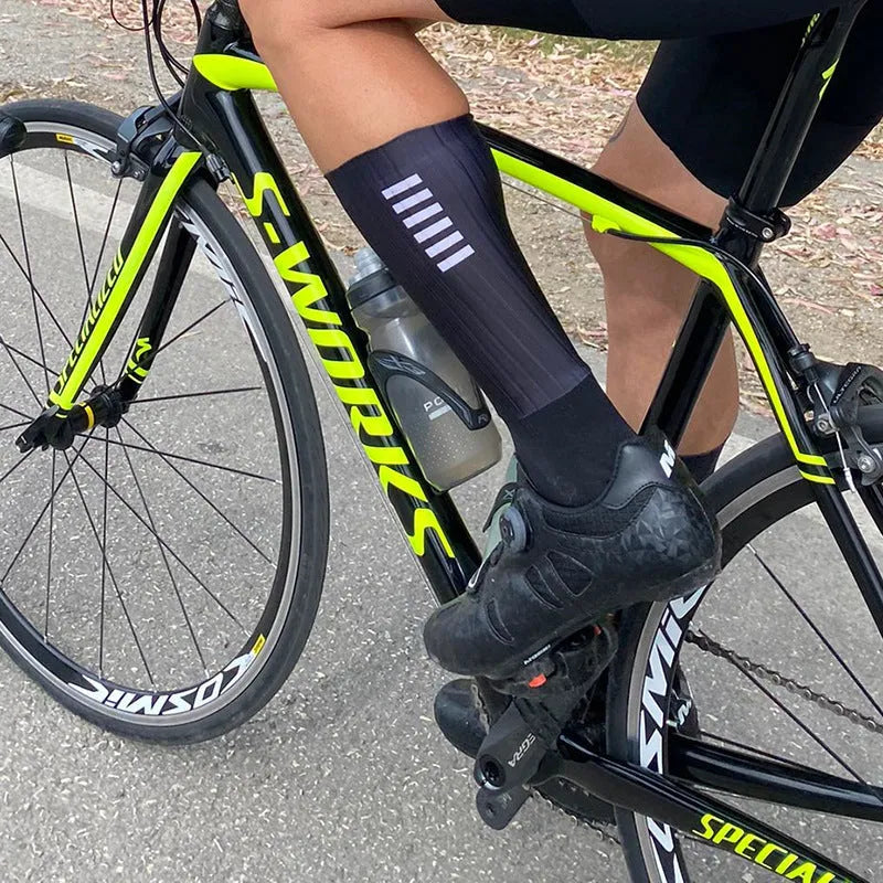 Cycling socks in chemical fibre blend fabric available in six colours for athletic sports