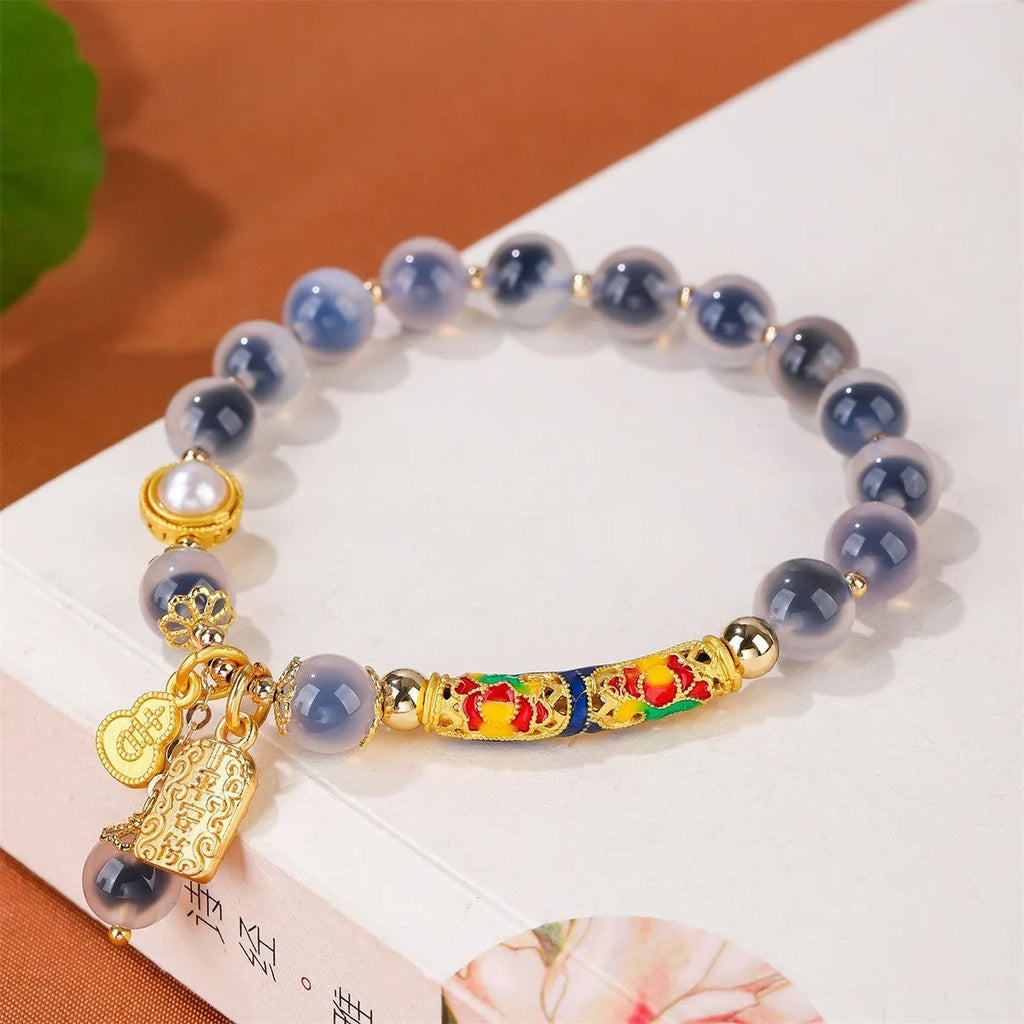 Sugar heart agate bracelet with retro minority design on woman's wrist showing handmade craftsmanship