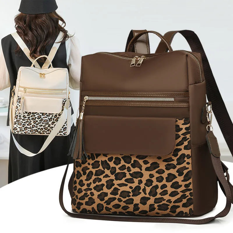 Leopard print women's large capacity nylon backpack in black, brown or beige with stitching and splicing.