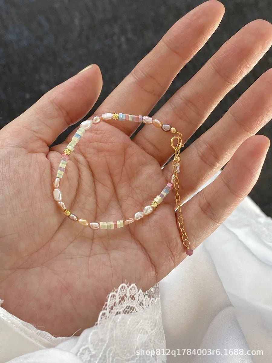 Purple natural pearl bracelet and necklace set with 14K gilded irregular U-shaped beads