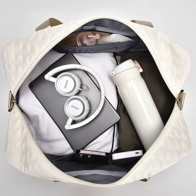 Oxford cloth portable travel bag in a solid colour with large capacity for buggies and leisure gear.