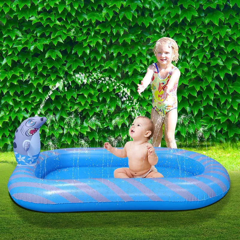 Blue inflatable dinosaur shark shaped water play pool for children in garden