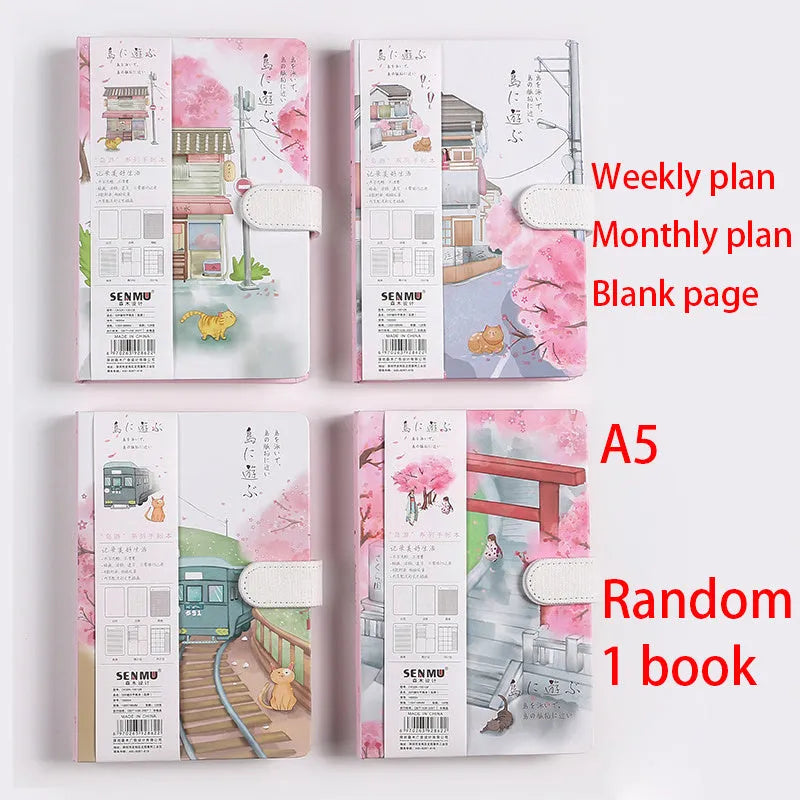 Open A5 wire-bound retro handbook showing full-colour illustrations, with a pen placed alongside.