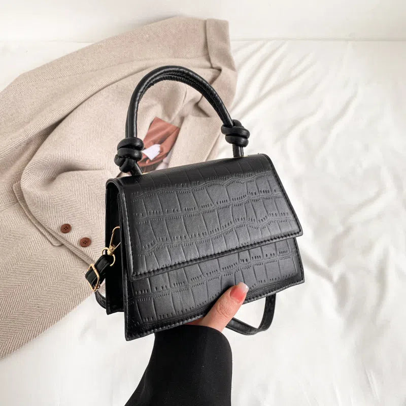 Urban minimalist PU leather commuter underarm bag for women in horizontal rectangle shape with stitched seams