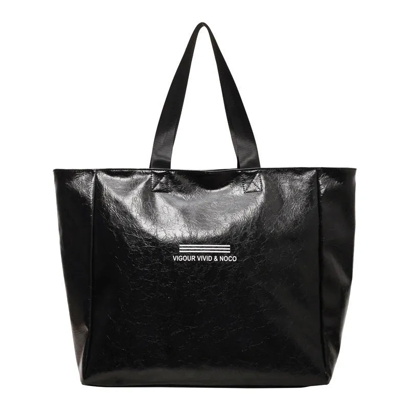 Large capacity PU tote bag for women in solid black, beige or brown, waterproof shoulder handbag for daily and travel use.