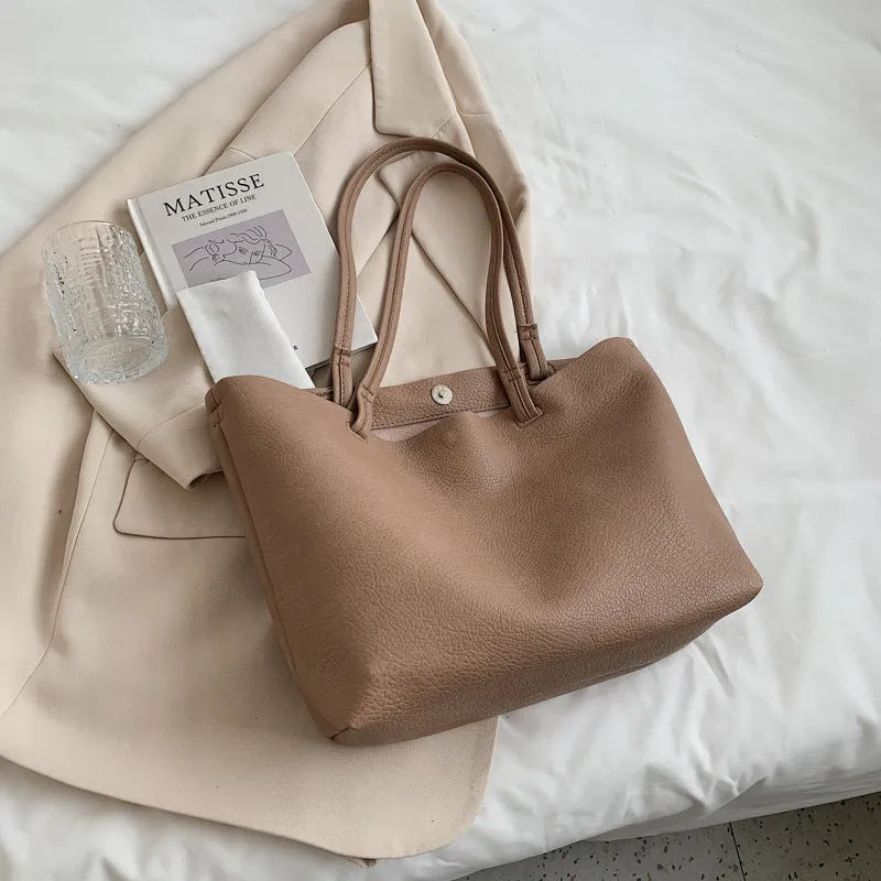 Women's retro shoulder bag in PU leather with double straps, soft handle, and 3D outer pocket, shown in five colours.