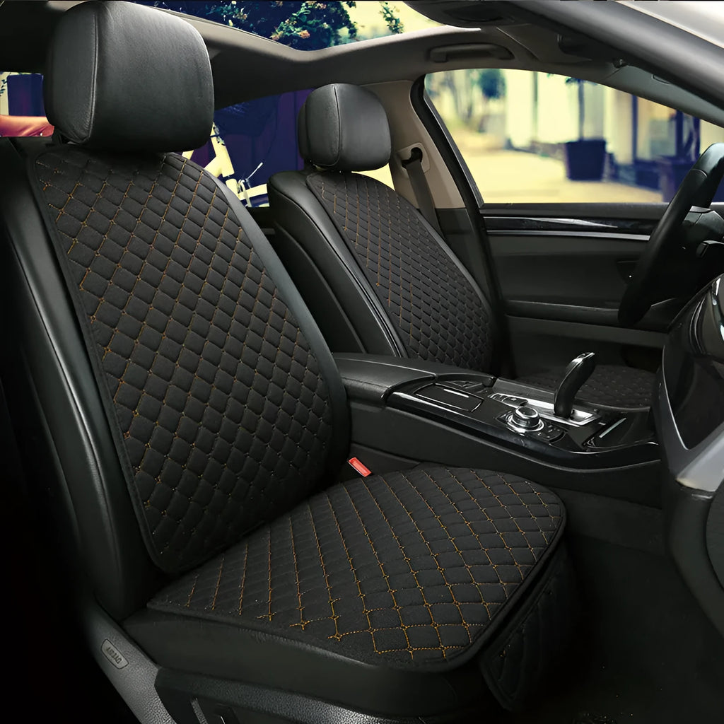 Linen car seat cushion with memory foam in Warm Cream colour on a car seat.