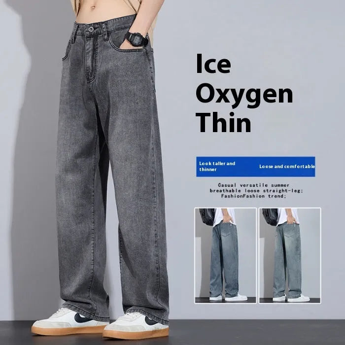 Straight leg denim trousers in a wide leg style on a hanger, showing the zip fly placket.
