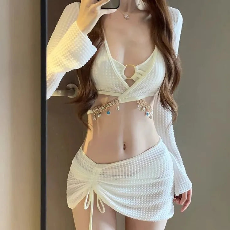 Women's long sleeve black bikini swimsuit with hot spring split style, made from polyester.