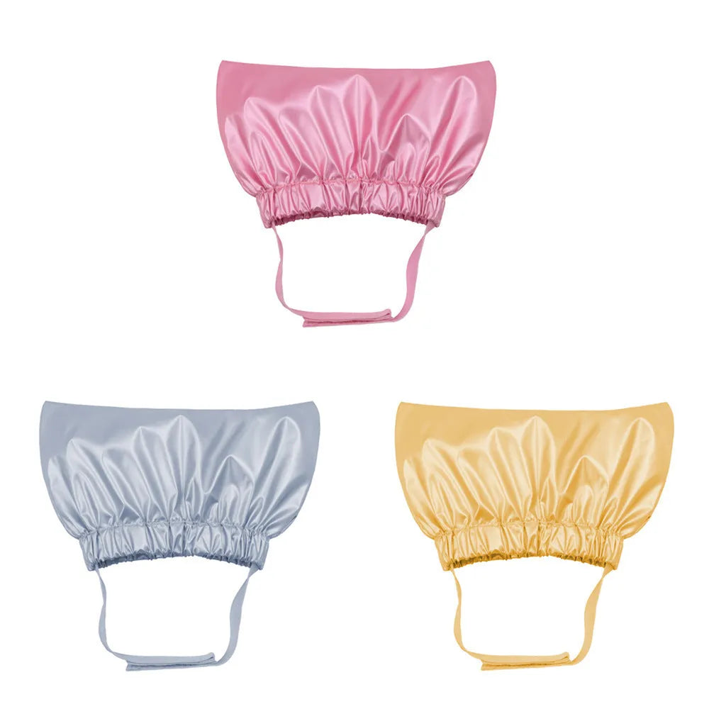 Adjustable waterproof shower cap for cats or dogs in silver, pink, or gold.