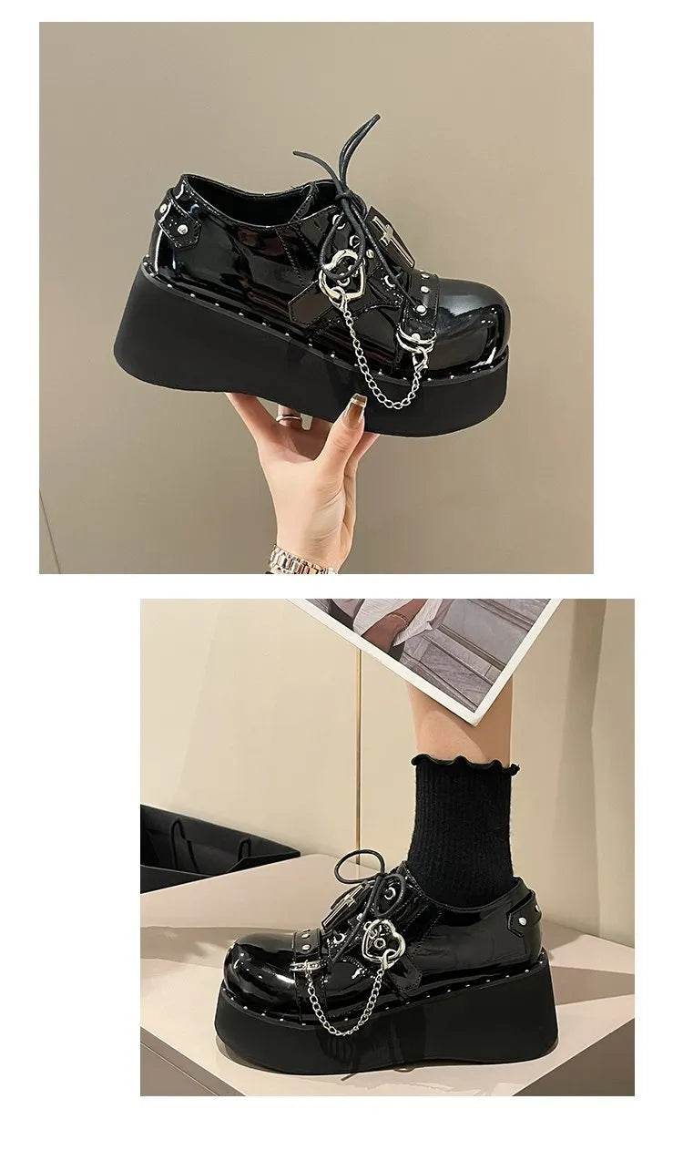 Solid black punk platform shoes with leather upper, rubber sole, and visible stitching detail