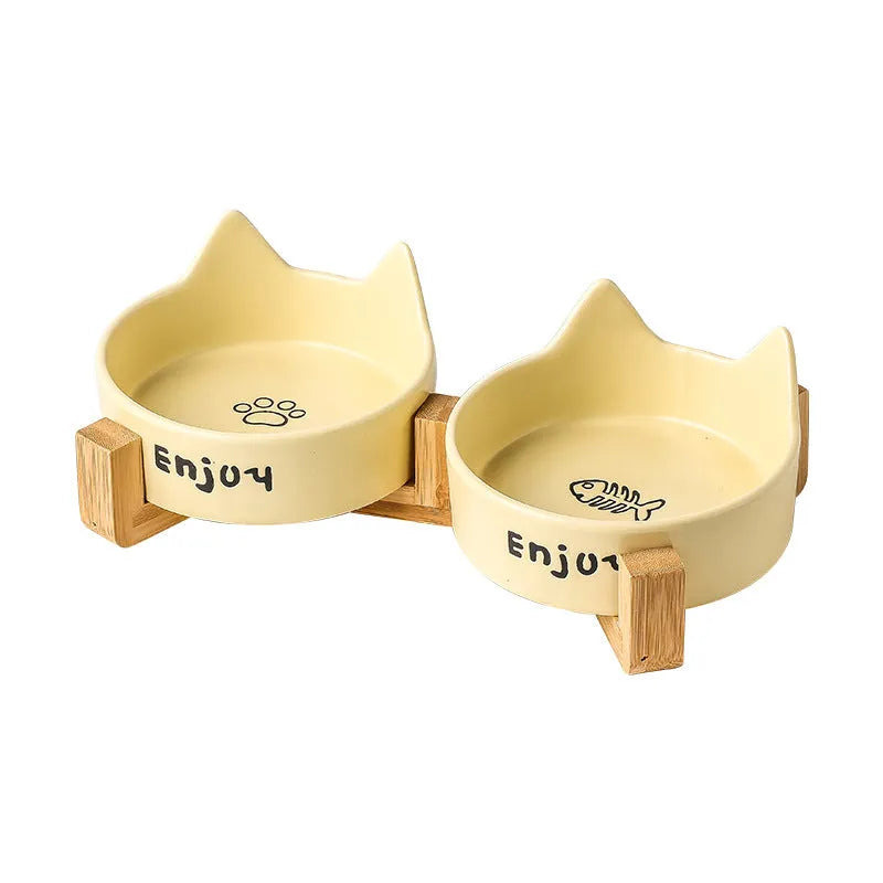 Ceramic cat bowl set with wooden anti-slip frame in cat paw design