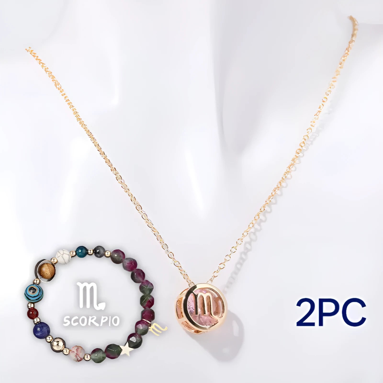 Natural stone beaded necklace and bracelet set laid flat, showing coordinated earth-toned beads.