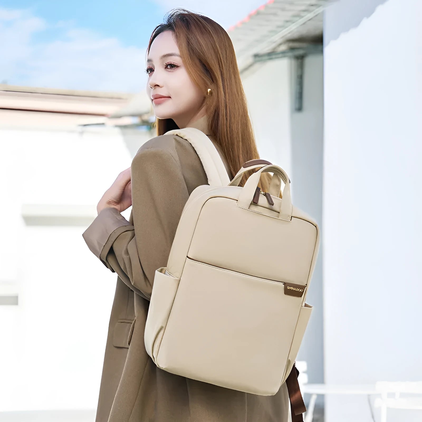 Large canvas travel backpack for women showing multiple internal compartments and zippered pockets