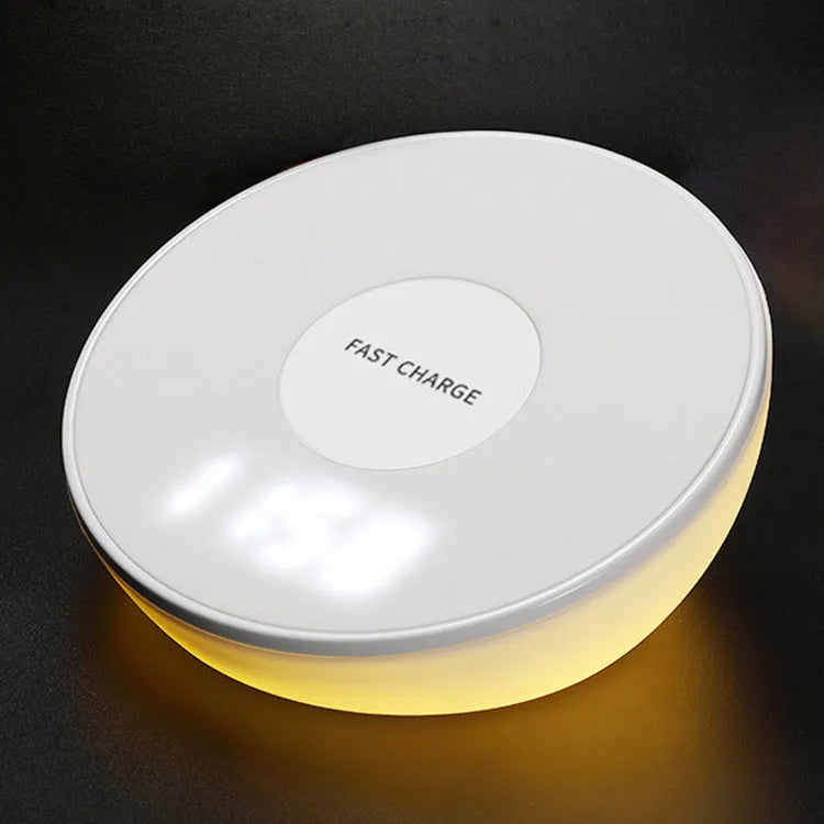 White wireless charger with digital clock display, alarm buttons and night light function