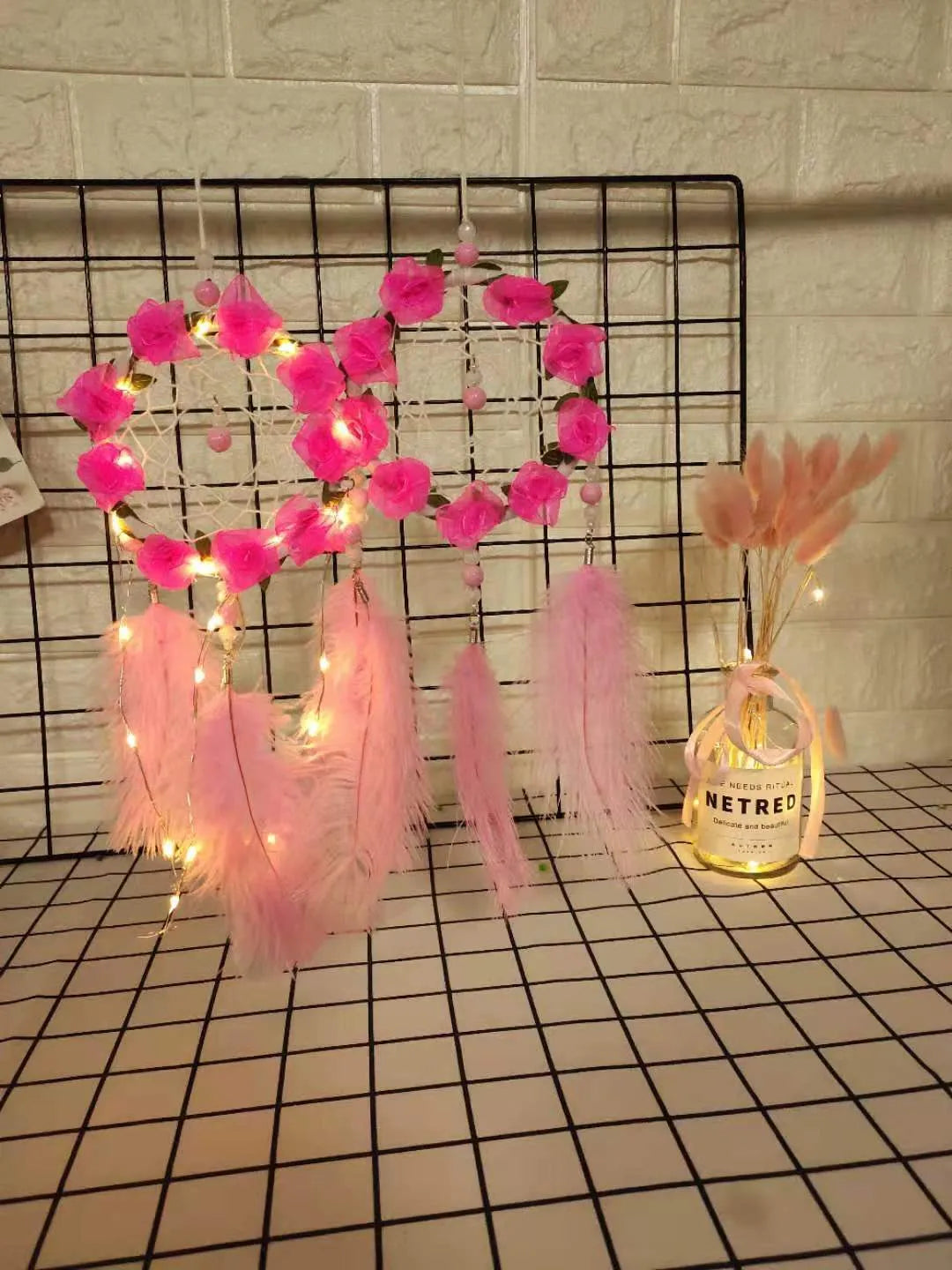 Pink dreamcatcher wind chime wall decoration with ostrich feathers, 10cm diameter