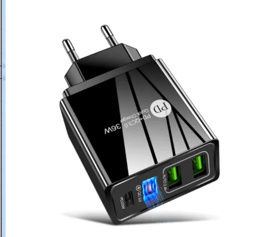 Black and white dual USB travel charger with international plug options showing indicator light