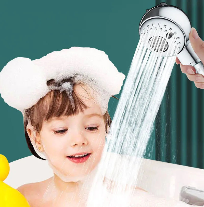 Silver handheld shower head for gentle pet and baby bathing without pressure.