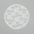 Round wedding veil head covering with floral decoration in black or white colours measuring 30cm diameter