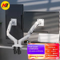 Aluminium dual monitor desk stand holding two screens, with mechanical adjustment arms.