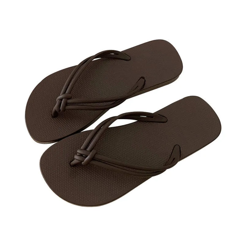 Men's PVC flip flops with toe covering in five colour options showing injection moulded sole detail