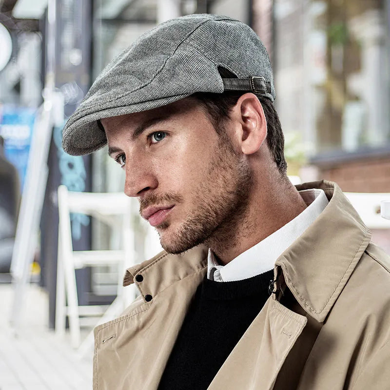 Men's cotton linen blend beret hat in black on a model, showing dome crown style.