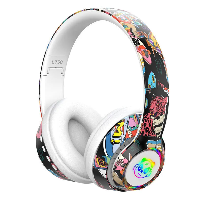 Graffiti wireless Bluetooth headset in black and white colours, shown with features like NFC and wireless charging.