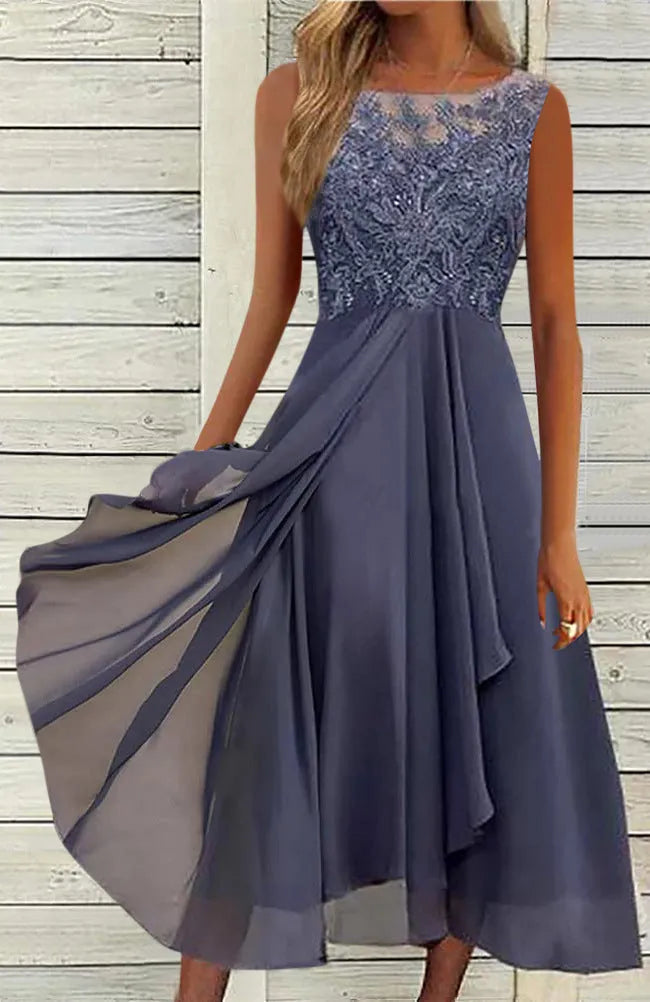 Women's sleeveless lace and chiffon dress in a princess style, shown in green colour.